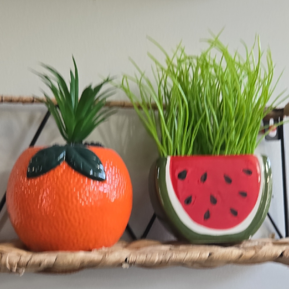 2 Faux Plants In Planters